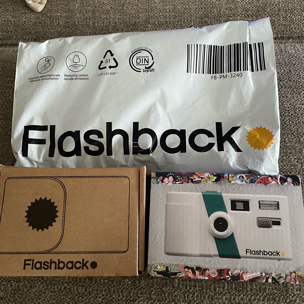 Flashback White and Teal Instant Camera with vegan leather case.